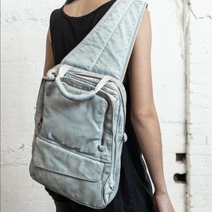 Nicholas K leather sling back bag